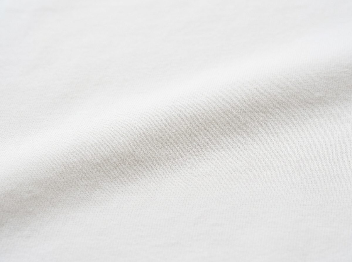Enzyme bio-washed cotton fabric surface with zero pilling or micro-fuzz